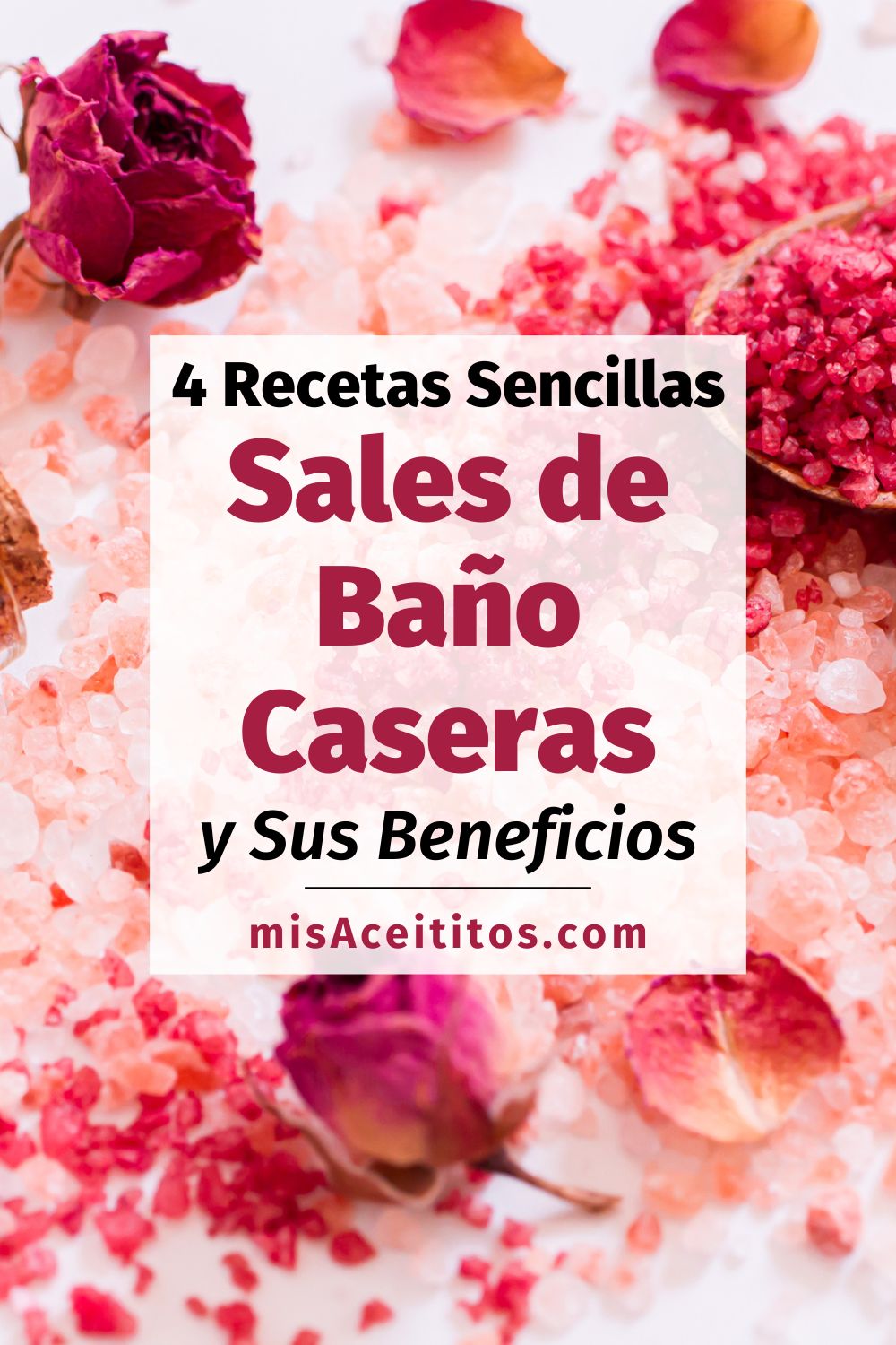 Sales de baño de colores rojos y rosas junto a rosas de diferentes colores.